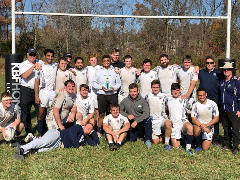 Xavier University Rugby Team Zane is fifth from left on back row (tenth from tight on back row) (beard and black hair) 