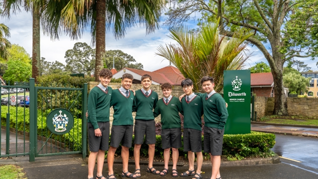 boys standing at the front gate of Dilworth School